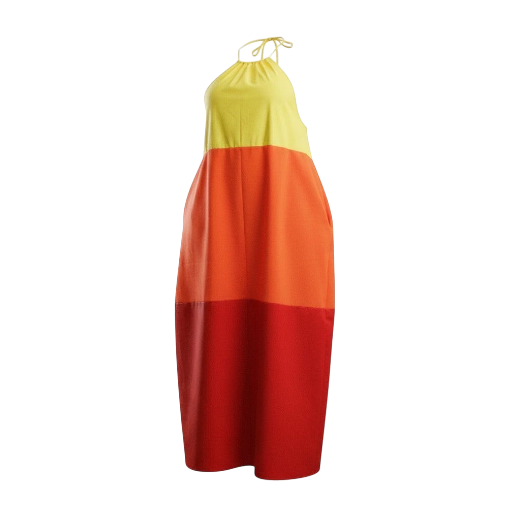 Shop Talaya maxi dress with yellow, orange, and red color block design. Cotton sateen fabric with side pockets and tie straps.